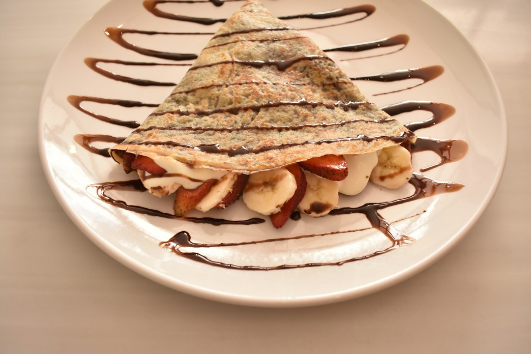 Sweet crepe with chocolate and toppings